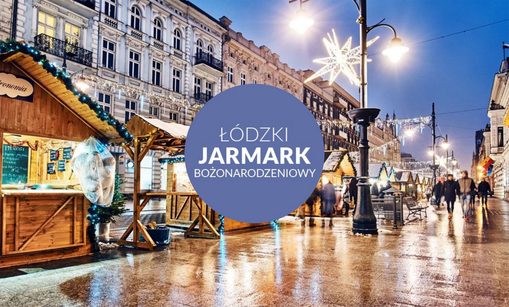 Zdjęcie ulicy w mieście. Na pierwszym planie stoiska 